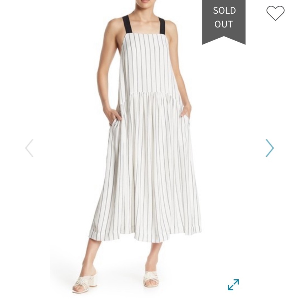 Melloday midi white dress with pockets.